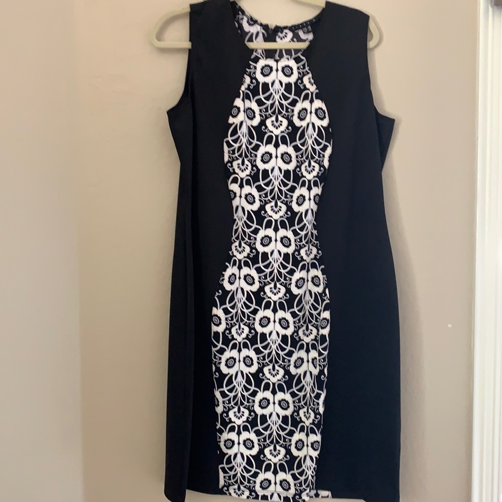 TIANA B. Black dress with white flower design